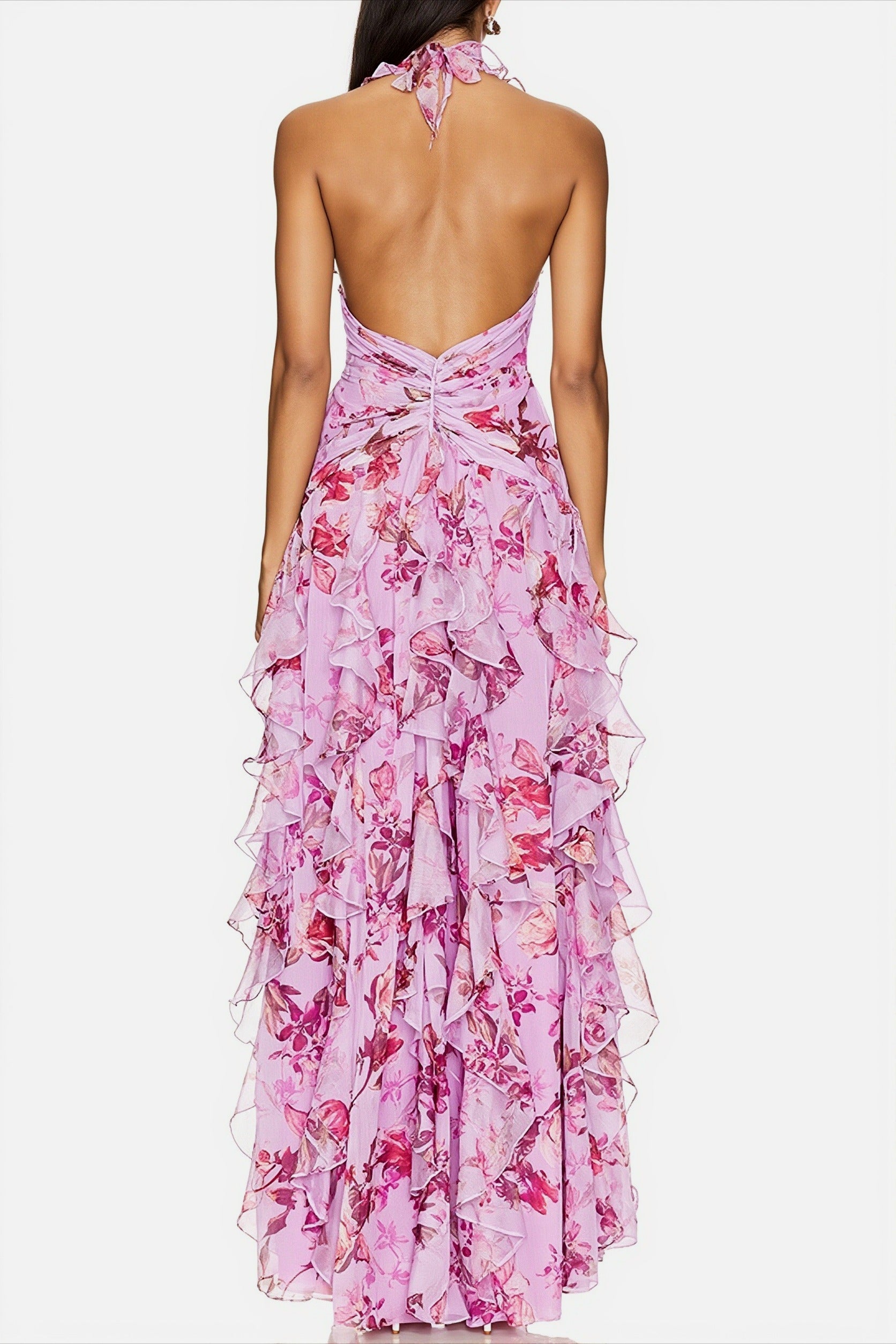 Detail van de bloemenprint op de chiffon halterjurk