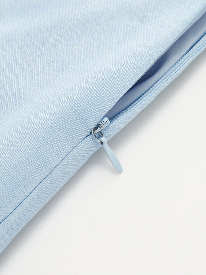 Close-up van de halter halslijn en crop top met geschulpte afwerking