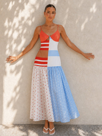 Dames midi slipdress met patchwork polkadot print op witte achtergrond