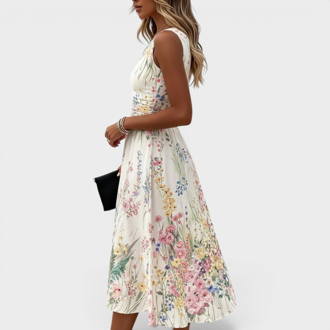 Mouwloze dames midi jurk met bloemenprint in een zachte stof