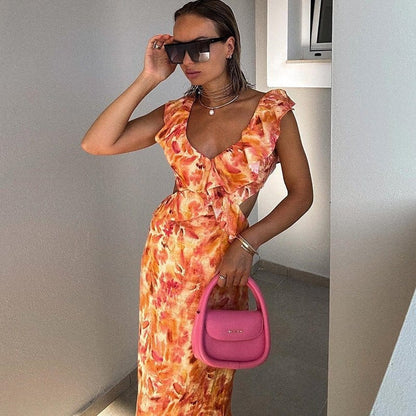 Dames Maxi Jurk Met Bloemenprint en Volant Oranje