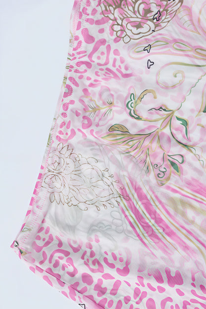 Set met haltercrop top met bloemenprint en aansluitende minirok roze