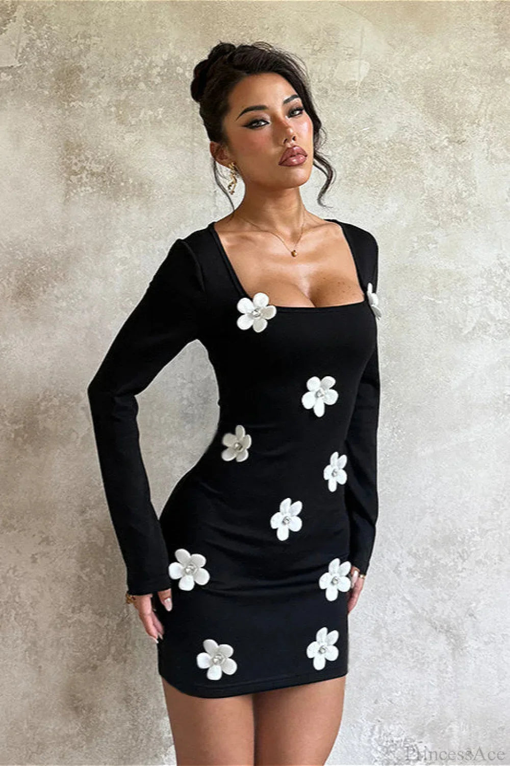 Dames bodycon mini jurk met bloemenprint en lange mouwen, achterkant