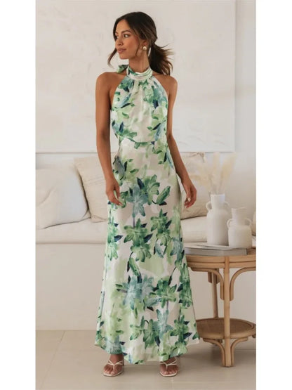 Dames maxi jurk met bloemenprint en open rug, achteraanzicht