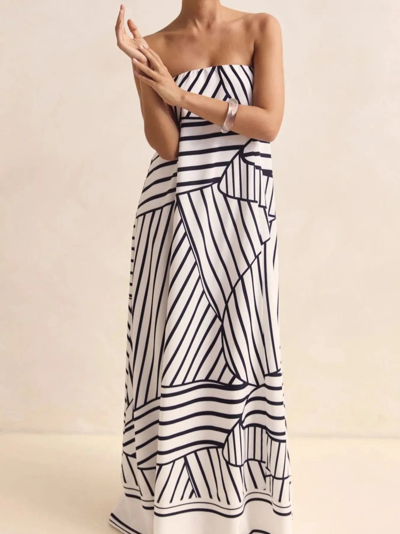 Maxi-jurk met plooien en print in buisstijl