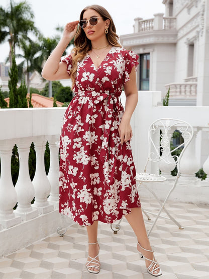 Midi-jurk met overslaghals, bloemenprint, strikceintuur en grote maten, rood