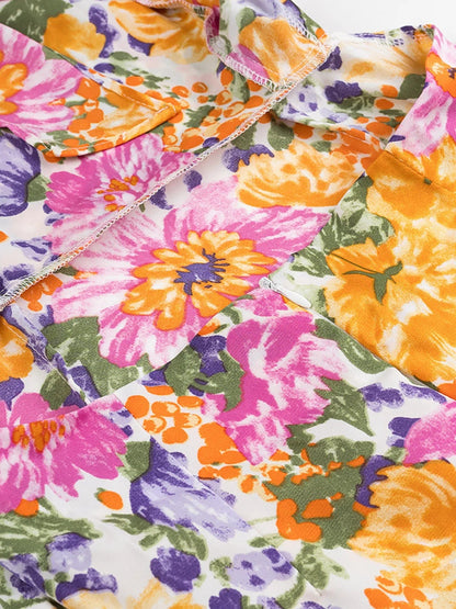 Polyester jurk met bloemenprint en gerimpelde zoom