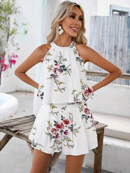 Witte zomerset met bloemenprint, ruches en halternek, tweedelig