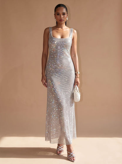Lange damesjurk met pailletten in een elegante zilveren uitvoering