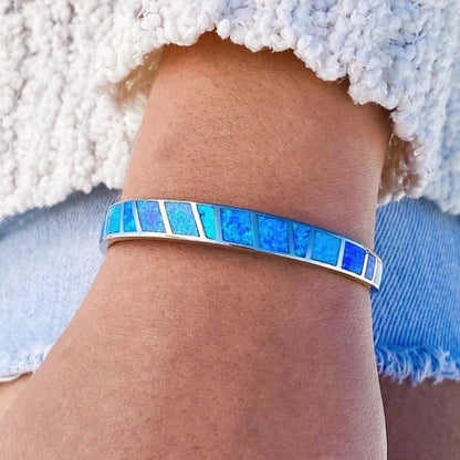 Zilveren armband met blauwe opaal voor dames